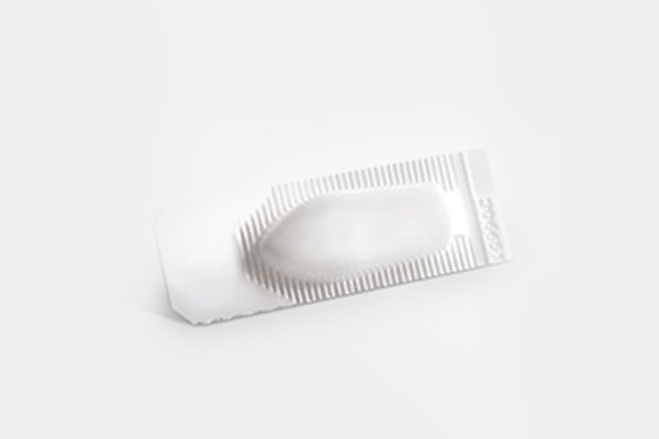  Óvulo espermicida em forma de pequenos supositórios vaginais.